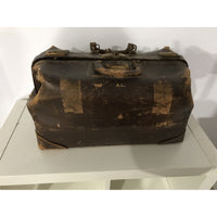 Old travel leather suitcase